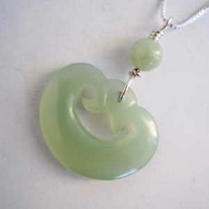 maori-influenced-light-green-jade kidney- shaped-pendant